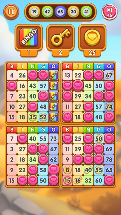Multi-card bingo round interface with active powerup boosters